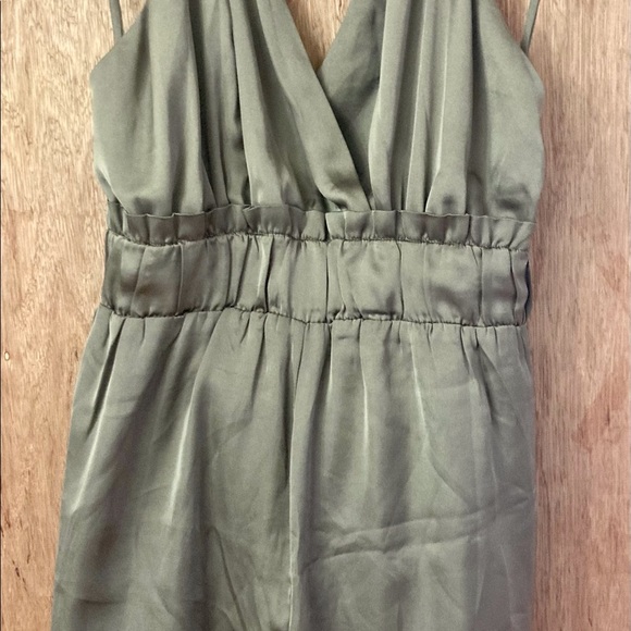 Shinestar Other - New with tags by Shinestar, gorgeous backless silky khaki romper! Size Medium